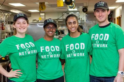 students wearing green t-shirts with Food Recovery network 